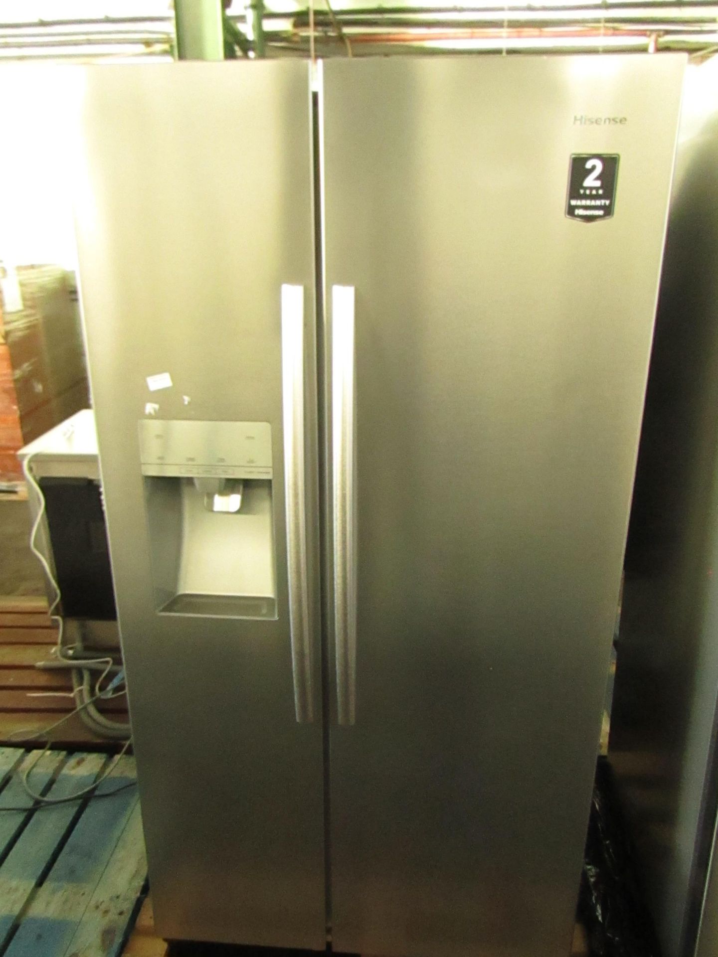 Hisence Fridge Freezer. RS694N41. Tested Working, a few small dents on the fridge door. RRP œ749