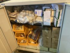 2 door steel cabinet with first aid supplies