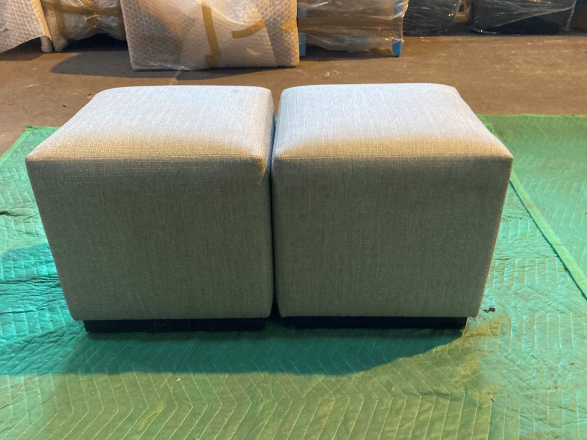 (2) Grey upholstered cube shaped stools