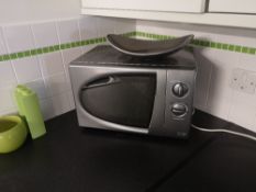 Contents of kitchen to include microwave, under-counter fridge and kettle