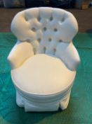 White upholstered vanity chair