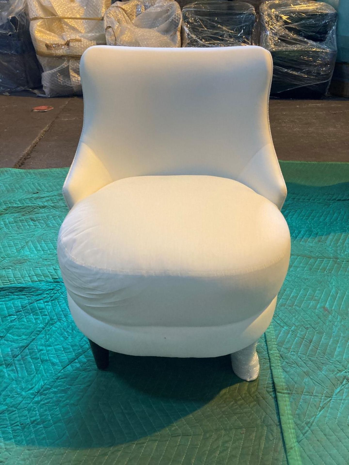 White upholstered vanity chair