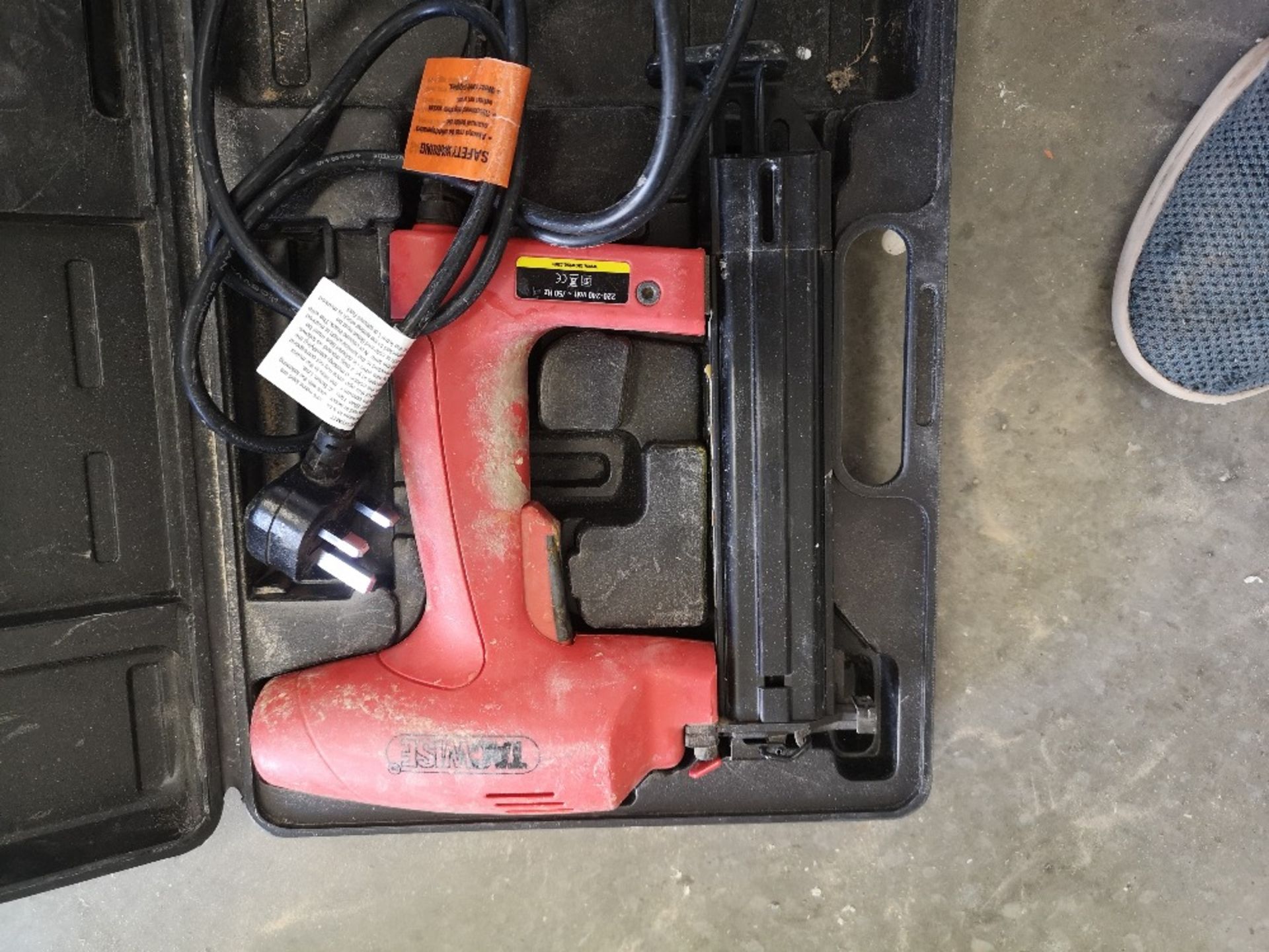 TacWise corded nail gun, with case