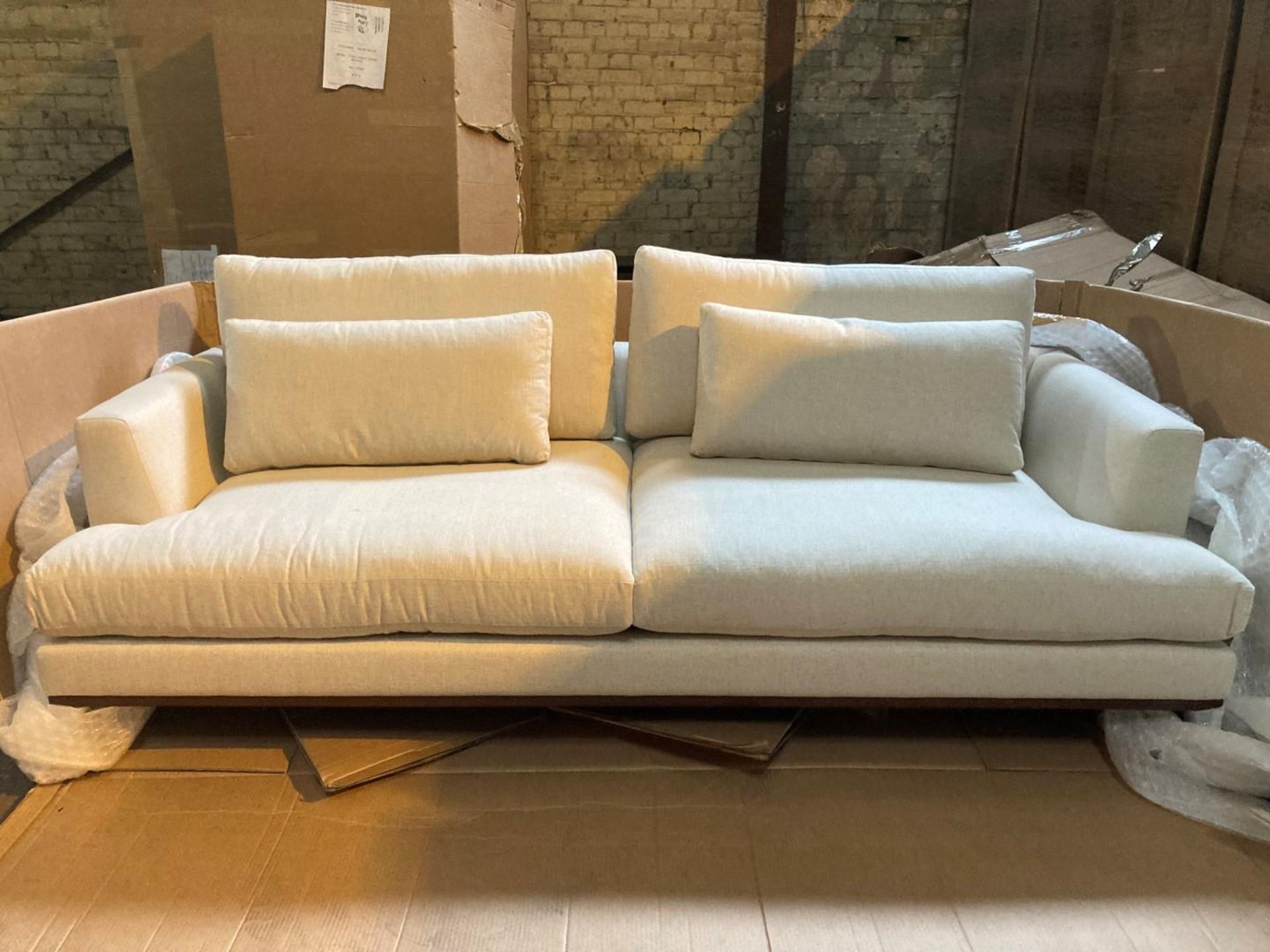 Natural white 3 seater sofa with medium oak plinth