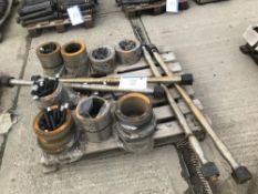 Pallet containing bucket pins, bearing sleeves and bolts