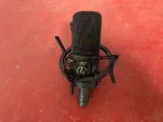 Audio-Technica AT 4033 condenser microphone with AT8441 boom attachment