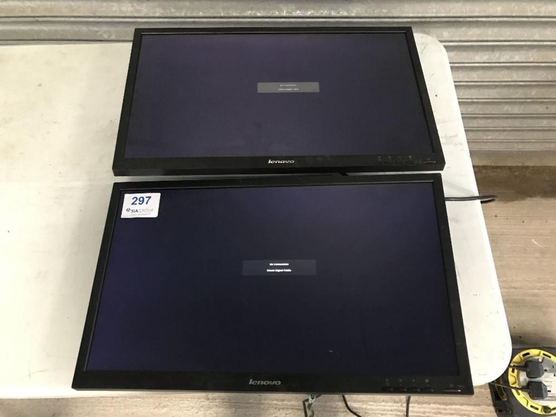 (2) Lenovo LT2423WC 24 inch flat screen monitors with wall mount