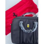 A Black Ferrari Laptop Case with Dust Cover