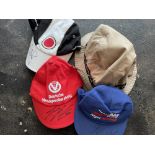 Four Baseball Caps Signed by Grand Prix Drivers
