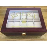 A Fine Rolex Ten-Watch Display Case in Polished Cherrywood