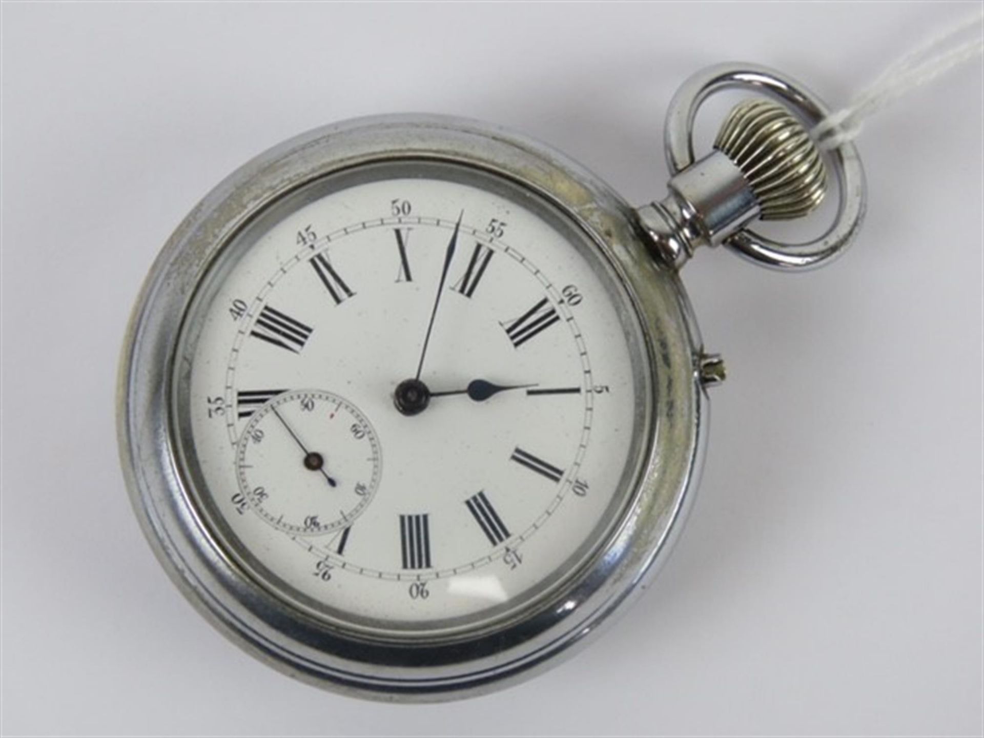 Double-sided pocket chronograph having English movement.