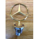 A Rare Gold-Plated Mercedes-Benz Bonnet Emblem