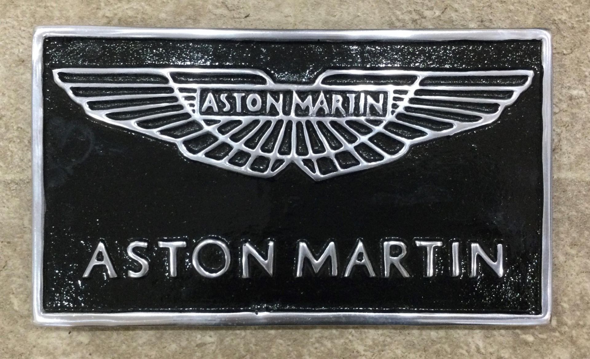 A Contemporary Black Painted Cast Aluminium Aston Martin Themed Wall Sign - Image 2 of 3