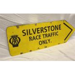 An original double-sided 'Silverstone Race Traffic Only' arrow sign