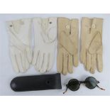 A rare pair of classic 1920s American sunglasses and period driving gloves.