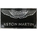 A Contemporary Black Painted Cast Aluminium Aston Martin Themed Wall Sign