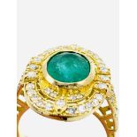 18ct gold, emerald and diamond ring.