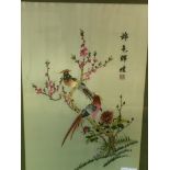 Framed and glazed oriental silk embroidery of birds and flowers, and another.