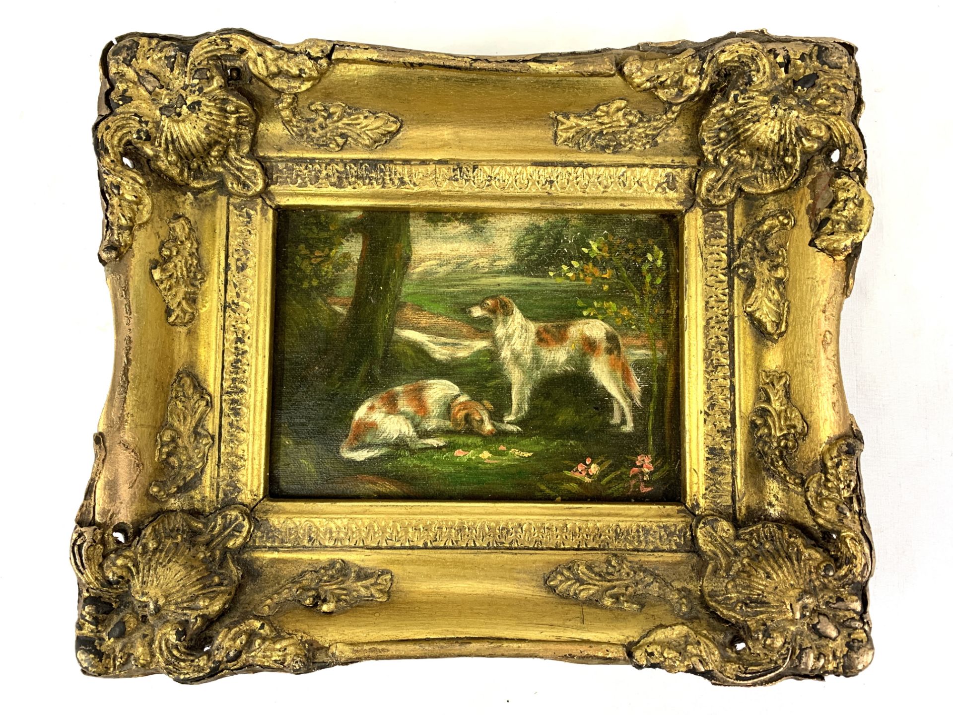 Gilt framed oil on canvas painting of two hounds