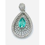 18ct white gold, emerald and diamond very fine filigree tear drop pendant.