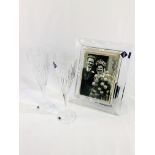 Two Edinburgh Crystal champagne flutes, boxed; together with an Edinburgh Crystal photograph frame.