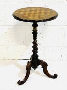 Mahogany chequerboard top wine table.