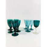 Nine Victorian green glass wine glasses