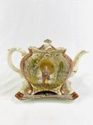 19th Century Chinoiserie picture sided teapot and matching stand.