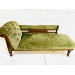 Edwardian mahogany framed green velvet upholstered chaise longue.