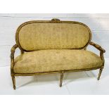 Regency gilt carved framed salon sofa.