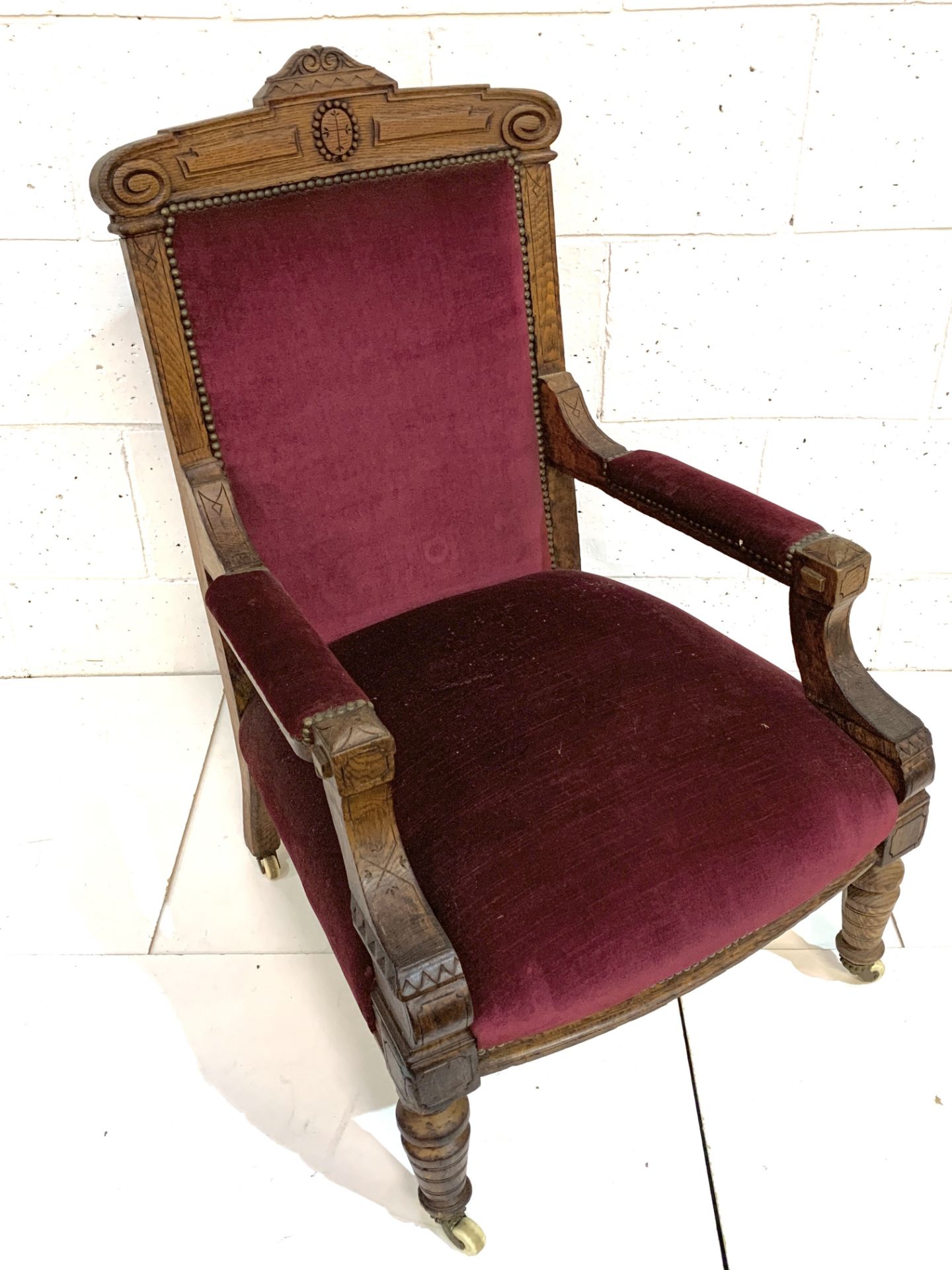 Edwardian mahogany framed red upholstered open armchair.