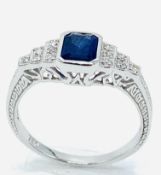 18ct white gold, sapphire and diamond ring.