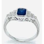 18ct white gold, sapphire and diamond ring.