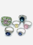 A collection of 6 sterling silver rings new but without tags set with quartz & semi precious stones.
