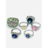 A collection of 6 sterling silver rings new but without tags set with quartz & semi precious stones.