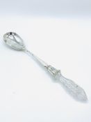 Hallmarked silver serving spoon with cut glass handle, London 1900 by Goldsmiths & Silversmiths.