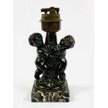 Figural cast metal table lighter