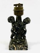 Figural cast metal table lighter