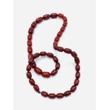 Necklace of red amber beads