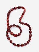 Necklace of red amber beads