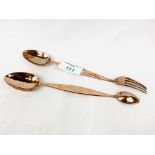 Two copper Benham and Son's serving utensils, marked with a crown and initials RY.