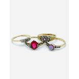 Four 9ct gold gem set rings