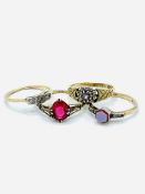 Four 9ct gold gem set rings