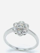 18ct white gold diamond floral ring.