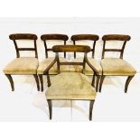 Set of four late Regency mahogany sabre leg chairs