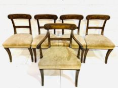 Set of four late Regency mahogany sabre leg chairs