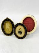 Two small oval frames, one with a watercolour portrait of a lady; and an oval bone edged frame