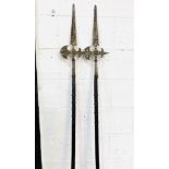 Two decorative Halberds on long wooden studded poles