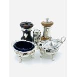 Silver cruets and pepper mill, with 2 other pepper mills.