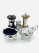 Silver cruets and pepper mill, with 2 other pepper mills.